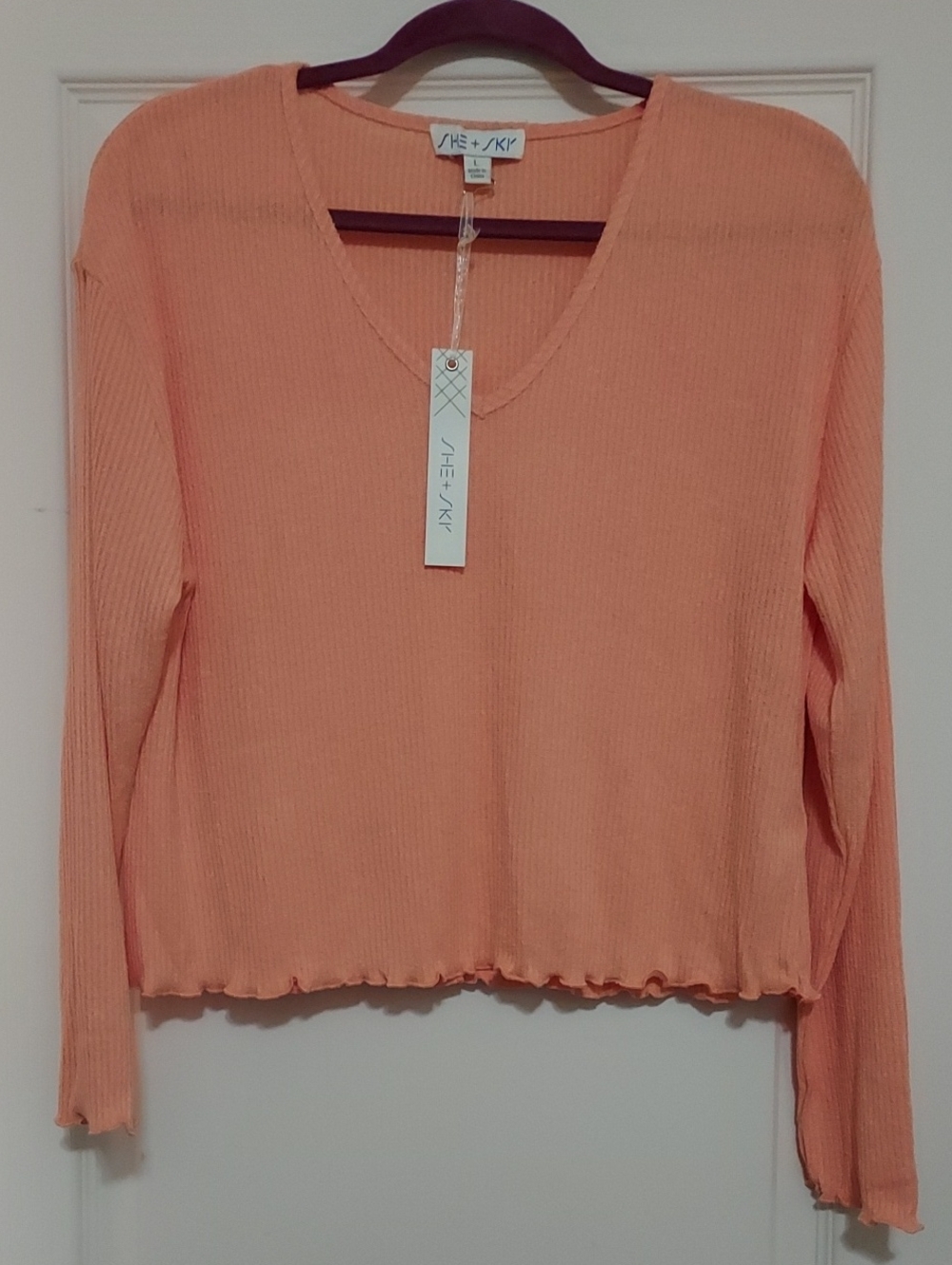 SHE+SKY Peach Ribbed V‑Neck Long Sleeve Top